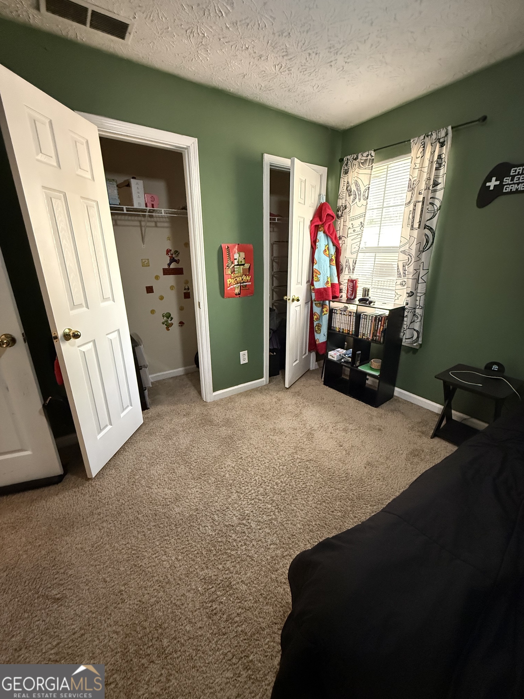 55 Jill Lane Covington, GA 30016 - Photo 31 of 52 a living room with furniture and a window