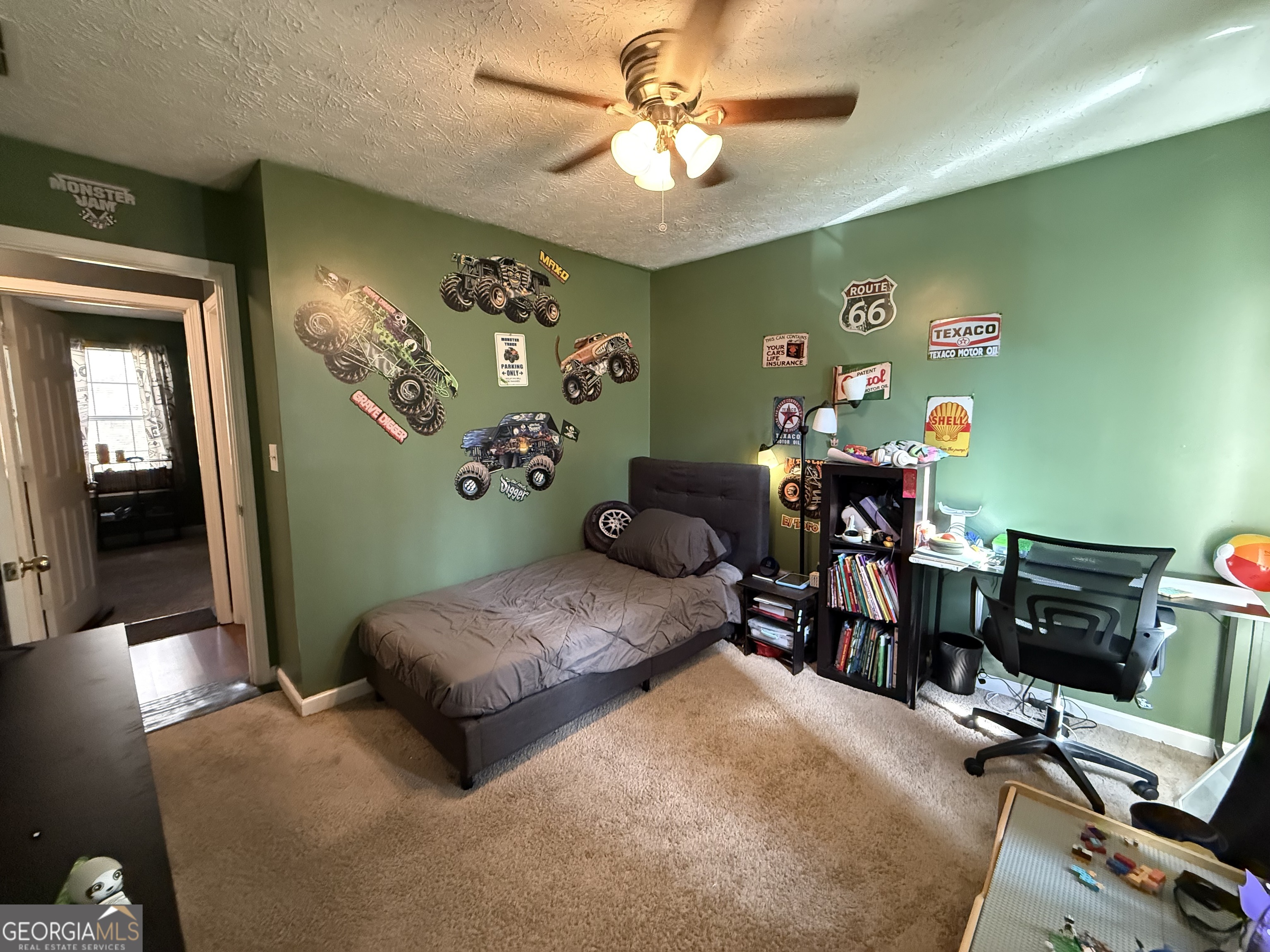 55 Jill Lane Covington, GA 30016 - Photo 38 of 52 a bedroom with a bed and furniture