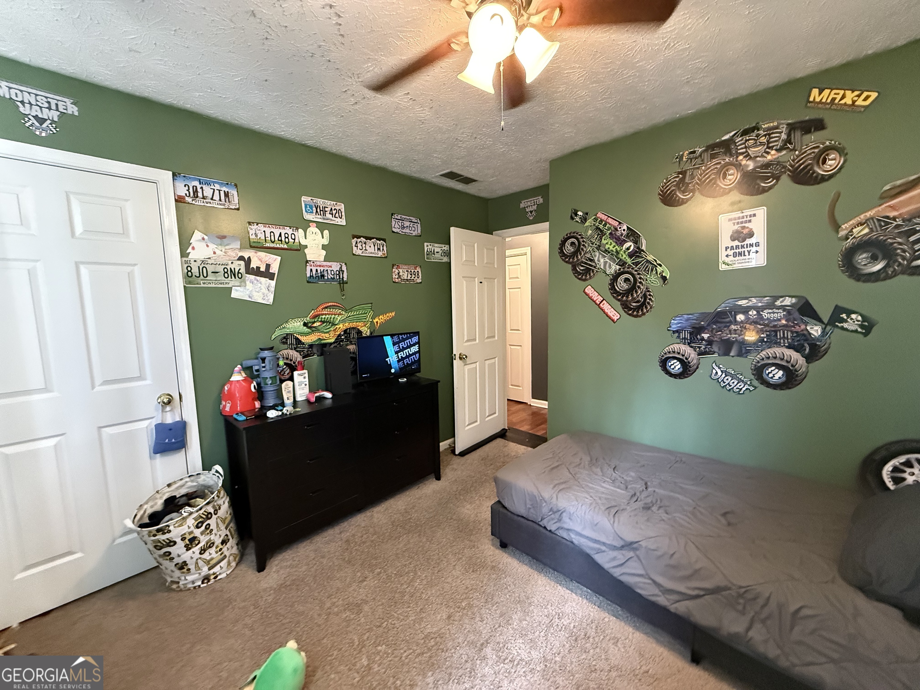 55 Jill Lane Covington, GA 30016 - Photo 39 of 52 a living room with furniture and a couch