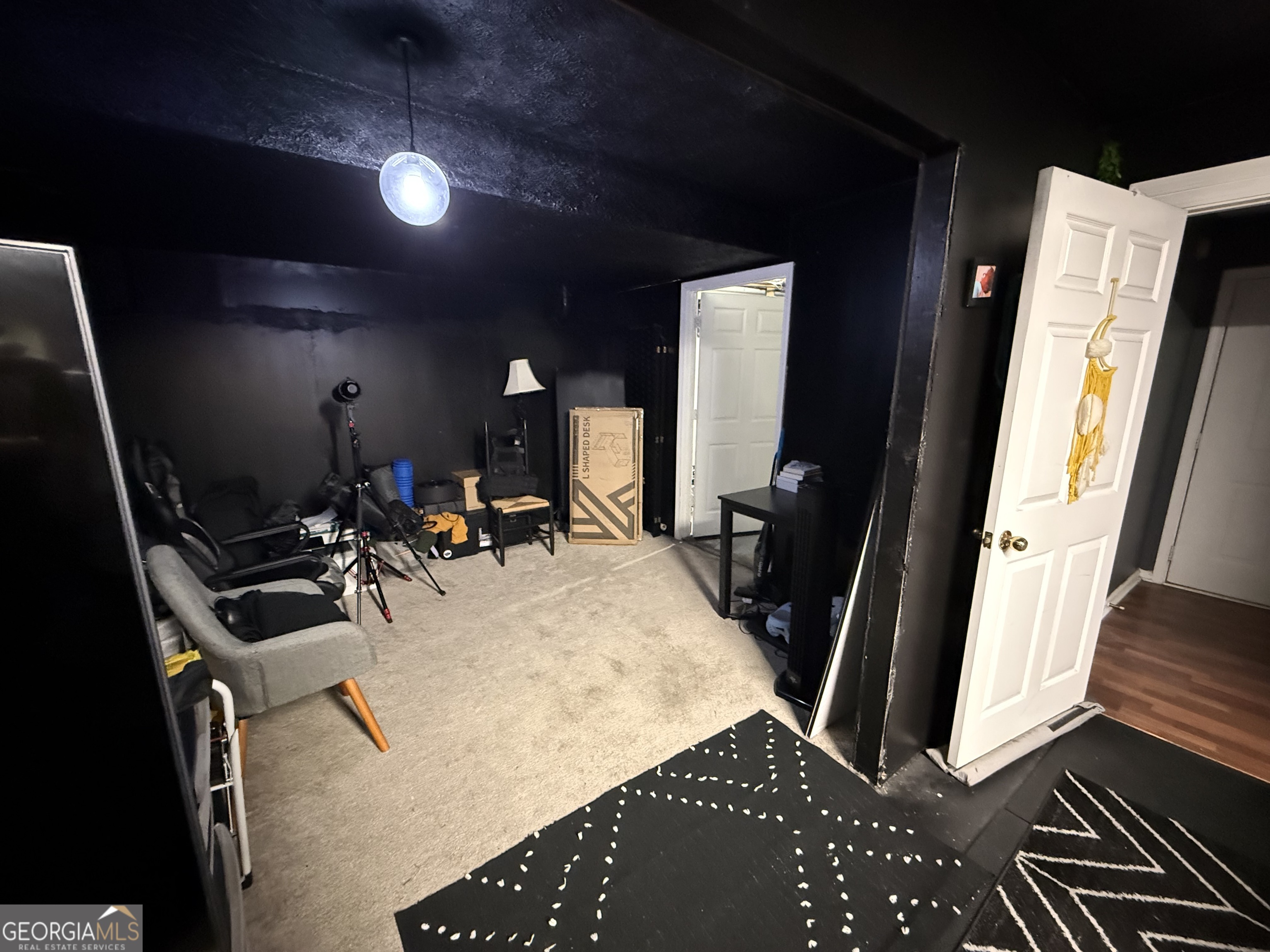 55 Jill Lane Covington, GA 30016 - Photo 43 of 52 a view of a room with gym equipment