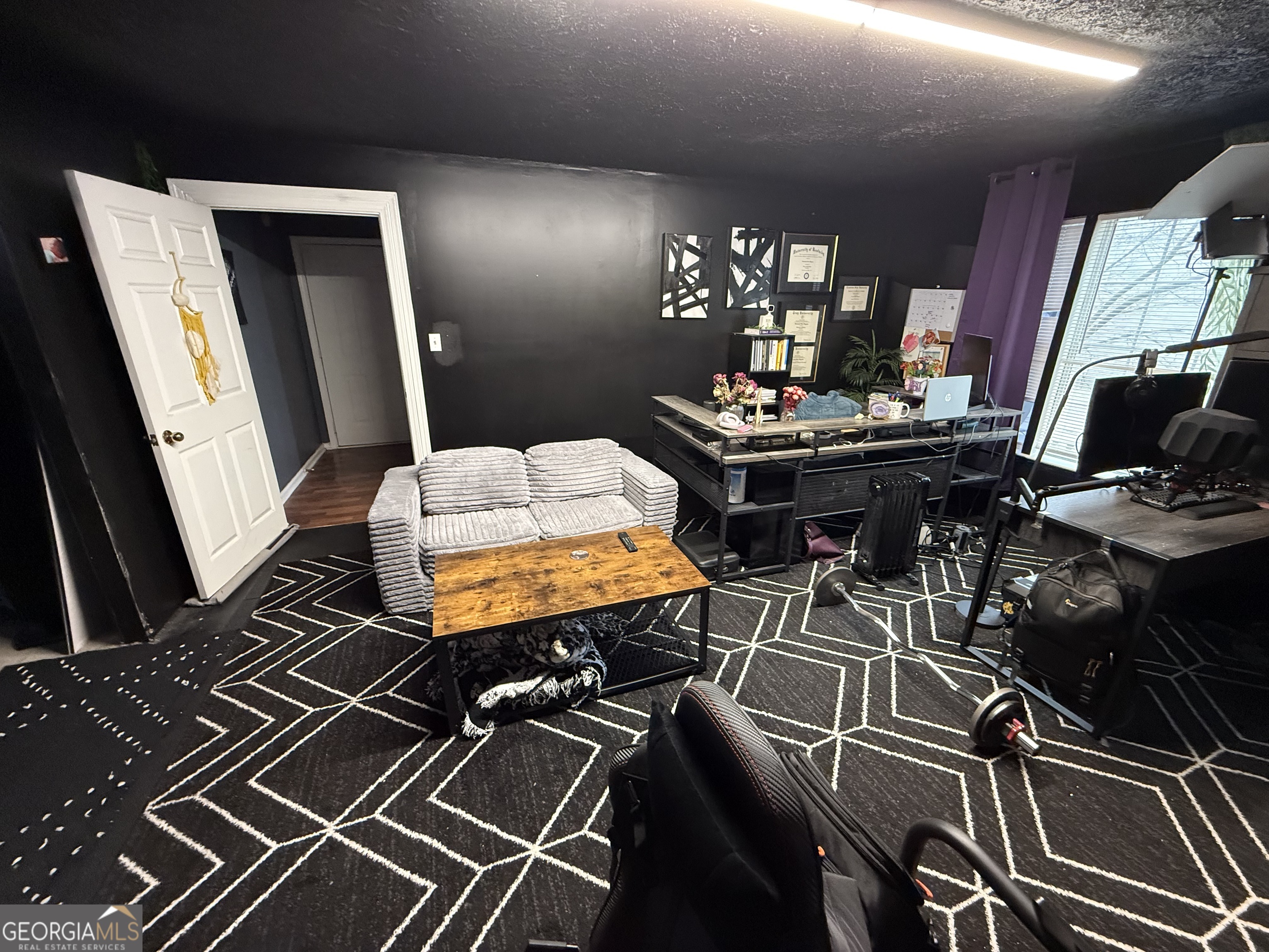 55 Jill Lane Covington, GA 30016 - Photo 46 of 52 a living room with table tennis air hockey table and chairs