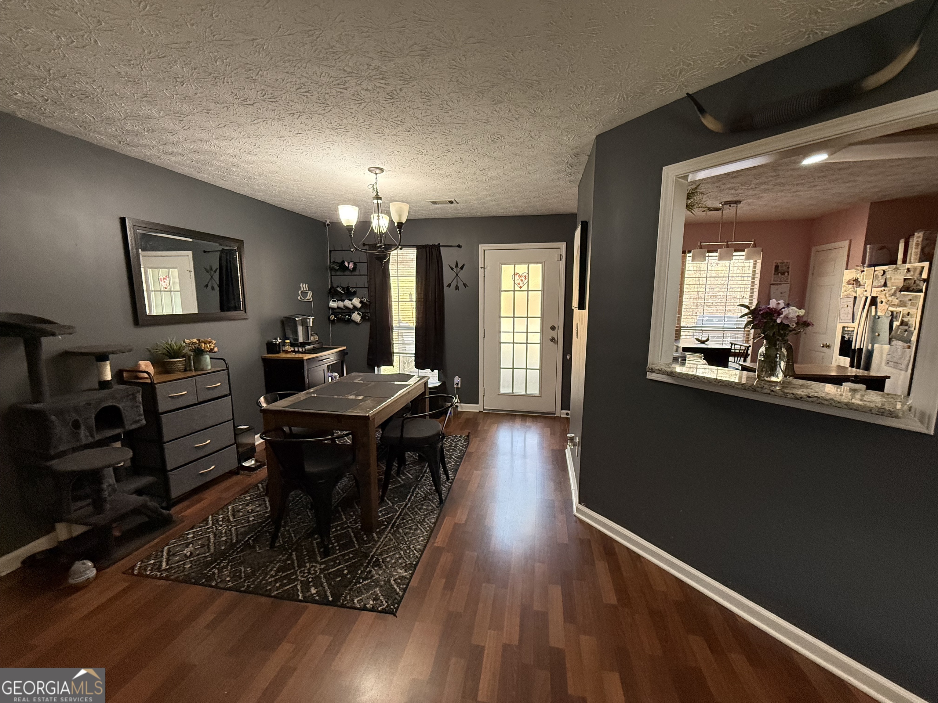 55 Jill Lane Covington, GA 30016 - Photo 7 of 52 a living room with furniture and wooden floor