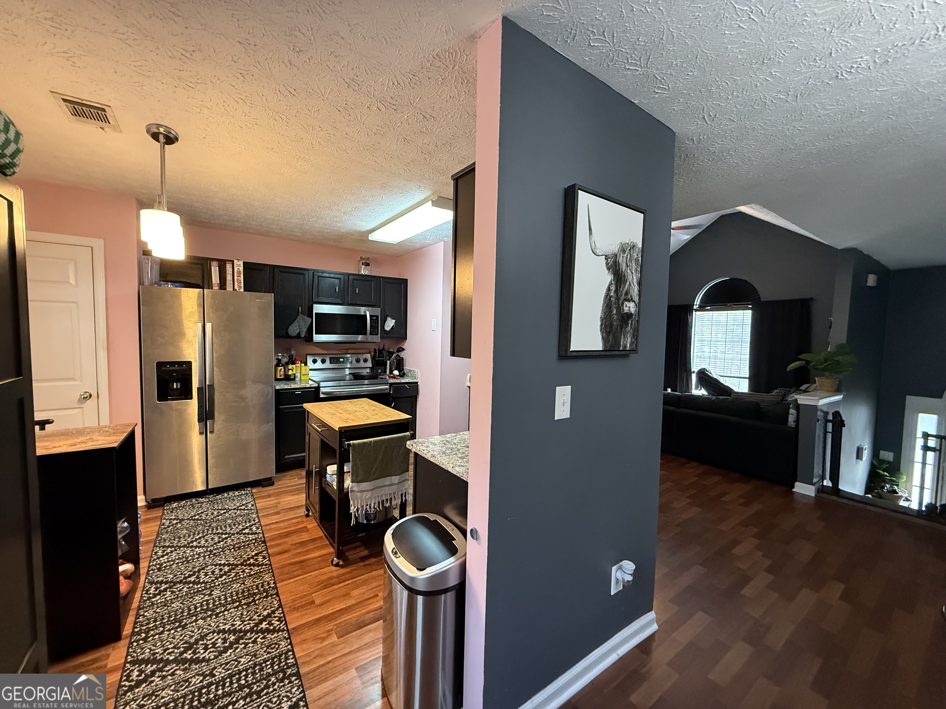 55 Jill Lane Covington, GA 30016 - Photo 9 of 52 a view of a living room and dining room