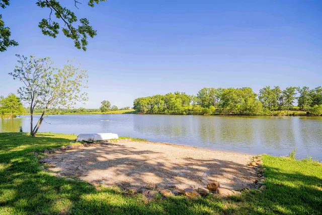 a view of a lake with a houses