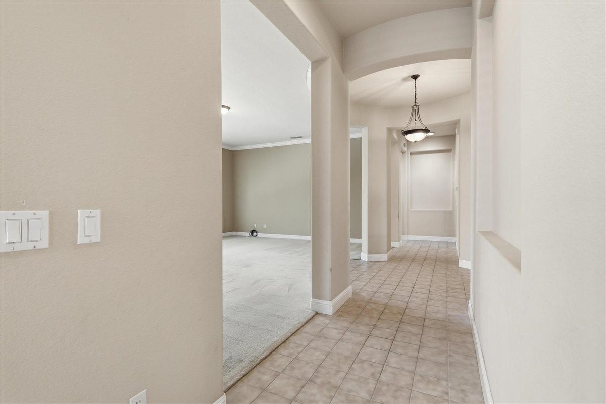 4129 Poppleton Way Carmichael, CA 95608 - Photo 11 of 48 wooden floor in a room with a mirror