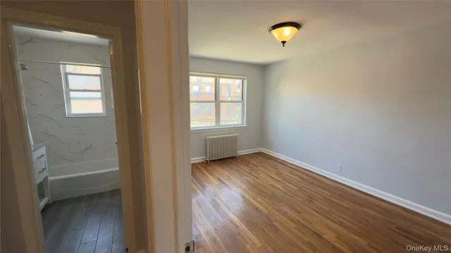 an empty room that has a window