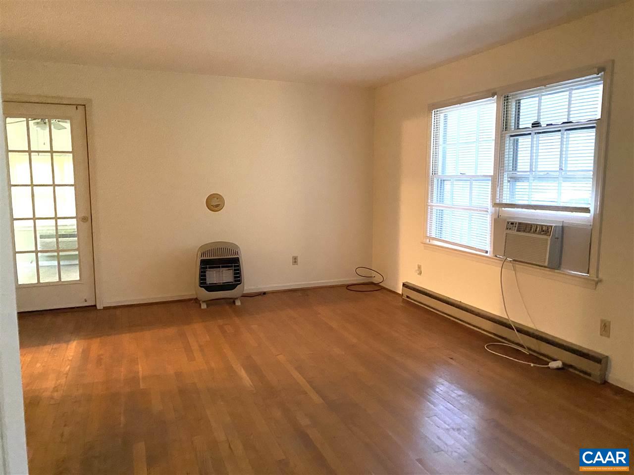 38 George James Loop Radiant, VA 22732 - Photo 4 of 24 an empty room with wooden floor and windows