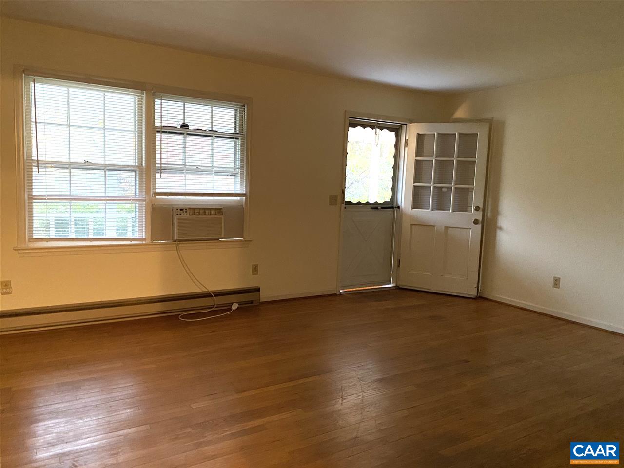 38 George James Loop Radiant, VA 22732 - Photo 5 of 24 an empty room with wooden floor and windows