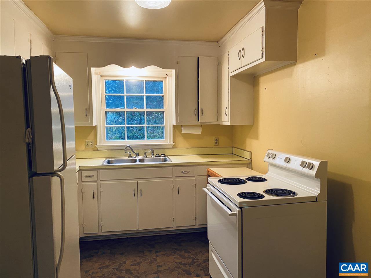 38 George James Loop Radiant, VA 22732 - Photo 6 of 24 a kitchen that has a sink a stove and refrigerator