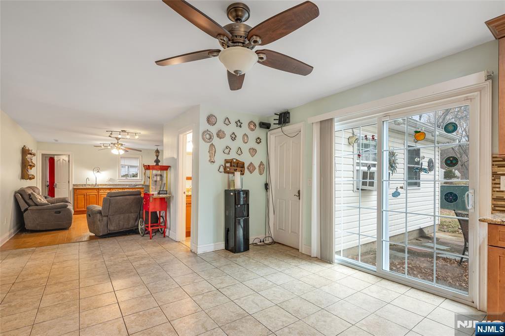 255 Knoll Road Lake Hiawatha, NJ 07034 - Photo 19 of 35 a view of a livingroom with furniture and a ceiling fan