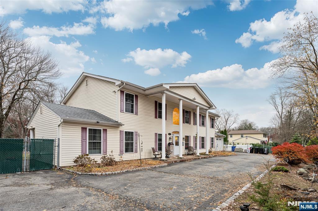 255 Knoll Road Lake Hiawatha, NJ 07034 - Photo 2 of 35 a front view of a house with a yard