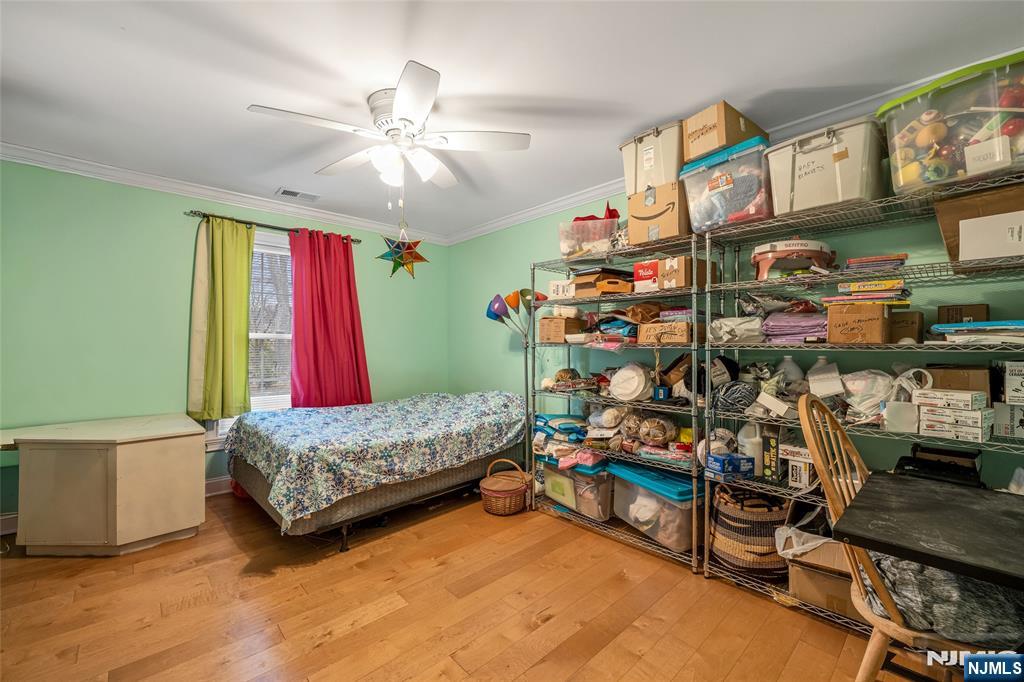 255 Knoll Road Lake Hiawatha, NJ 07034 - Photo 22 of 35 a living room with furniture and a chandelier