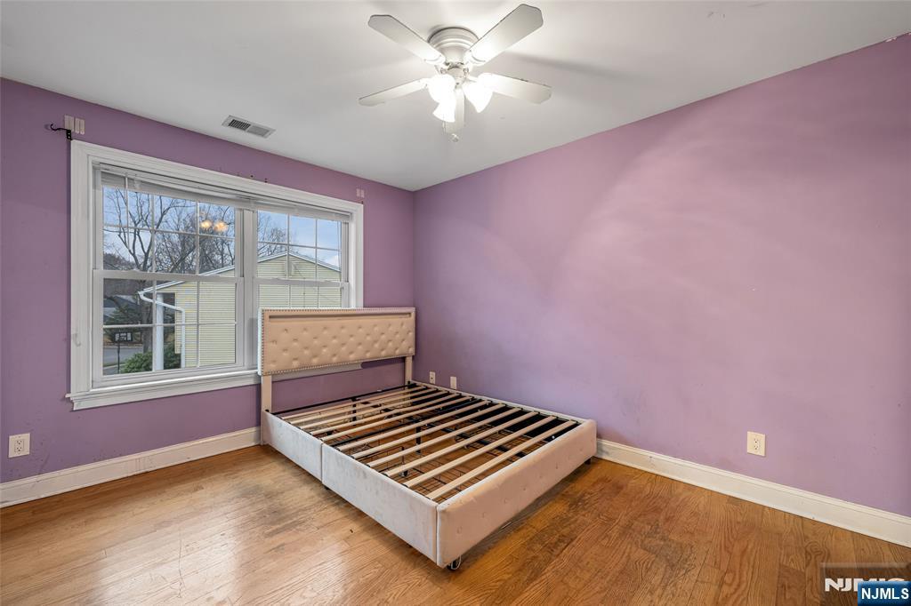 255 Knoll Road Lake Hiawatha, NJ 07034 - Photo 27 of 35 a bedroom with a bed and a window