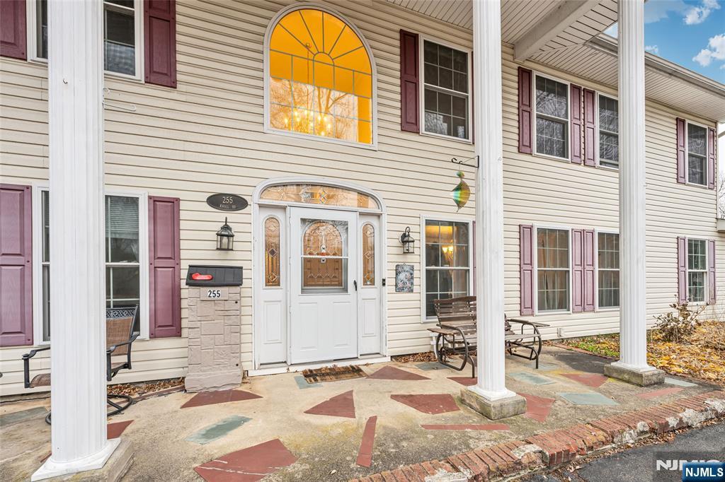 255 Knoll Road Lake Hiawatha, NJ 07034 - Photo 4 of 35 a view of a house with a door and wooden walls