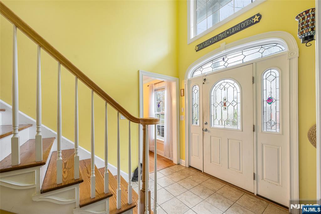 255 Knoll Road Lake Hiawatha, NJ 07034 - Photo 6 of 35 a view of an entryway with wooden floor and door