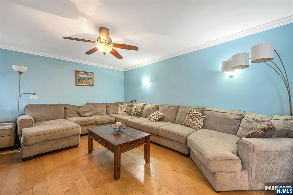 255 Knoll Road Lake Hiawatha, NJ 07034 - Photo 7 of 35 a living room with furniture and a ceiling fan
