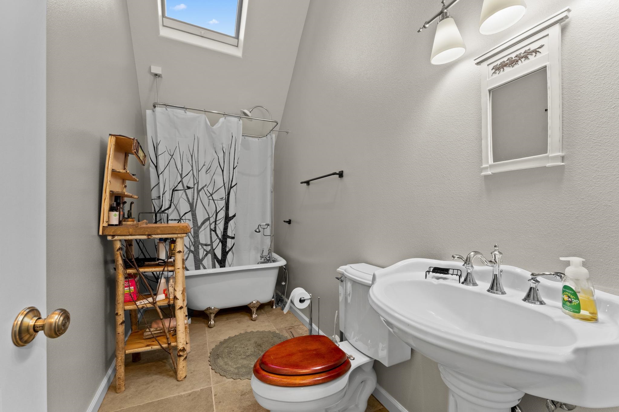 1341 Valley Ranch Drive Clio, CA 96106 - Photo 31 of 50 a bathroom with a sink toilet and a bathtub
