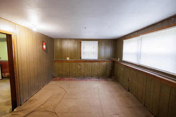 a view of hallway with windows