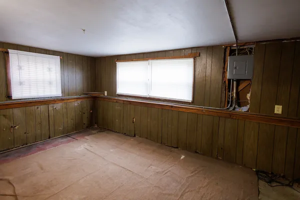a view of an empty room with a window