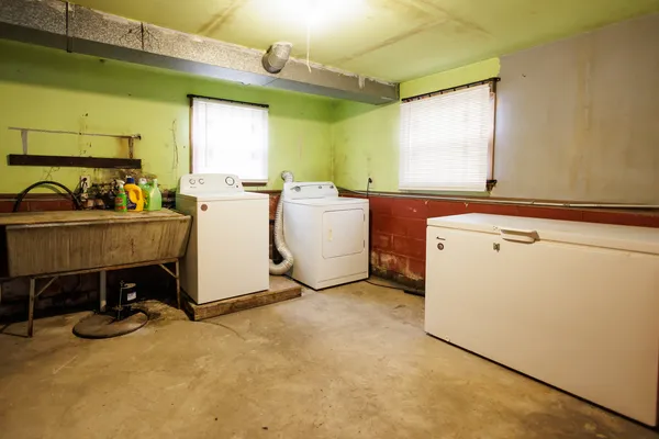 a room with storage and utility