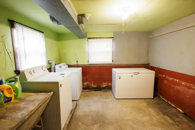 a utility room with a washer and dryer