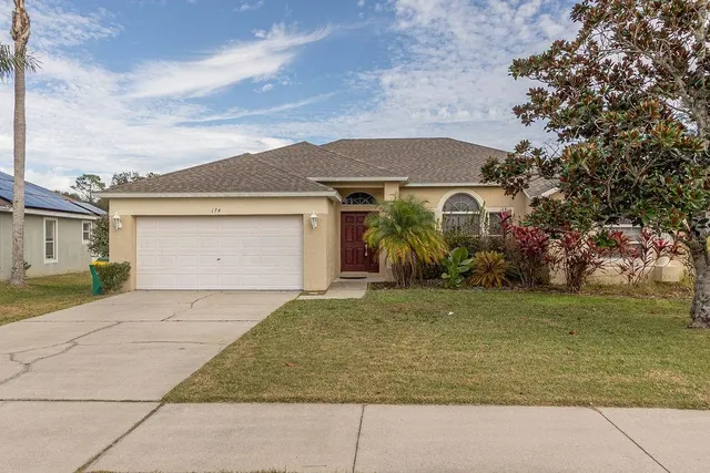 front view of house with a yard