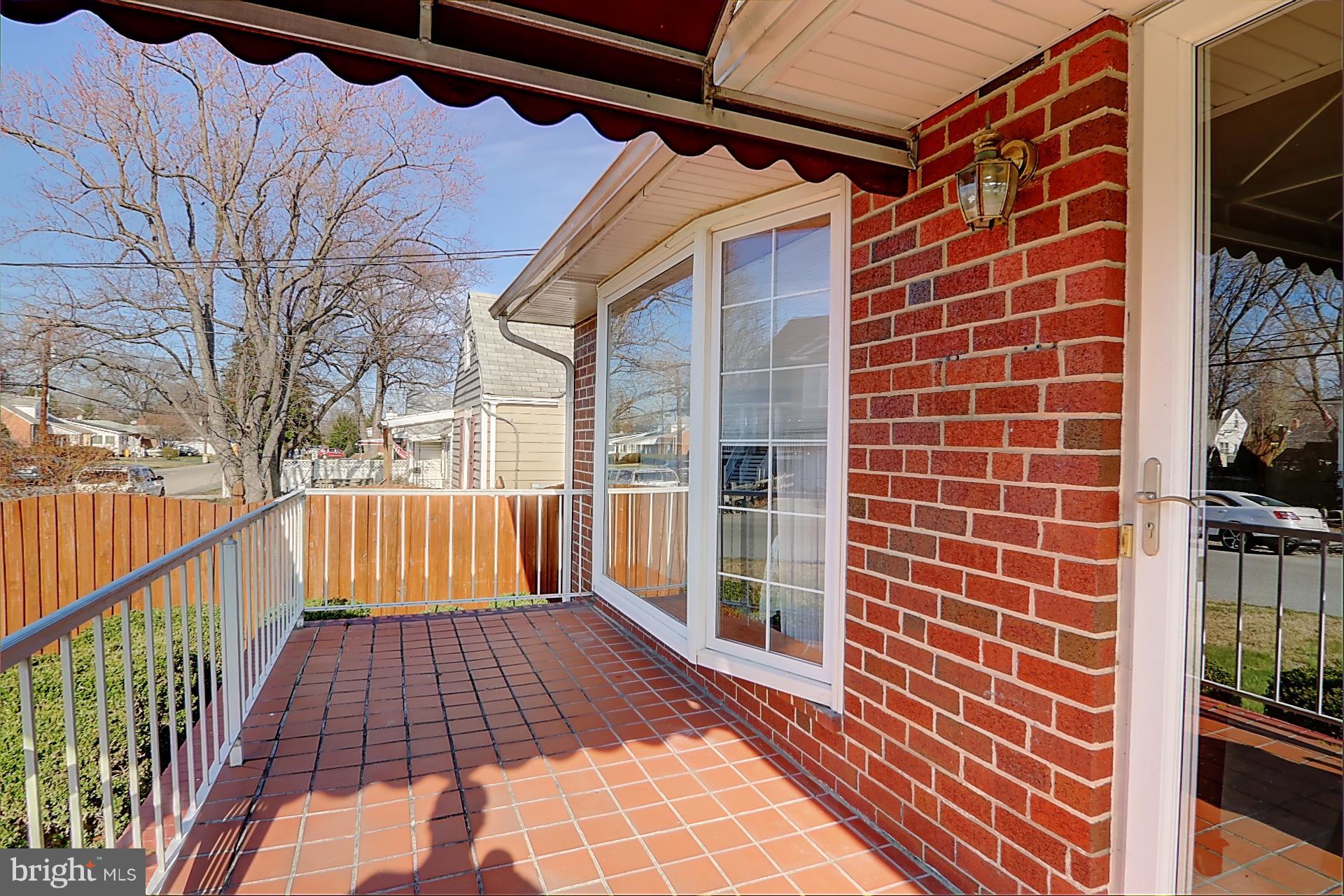 173 Carroll Road Pasadena, MD 21122 - Photo 14 of 16 Rocking Chair Front Porch