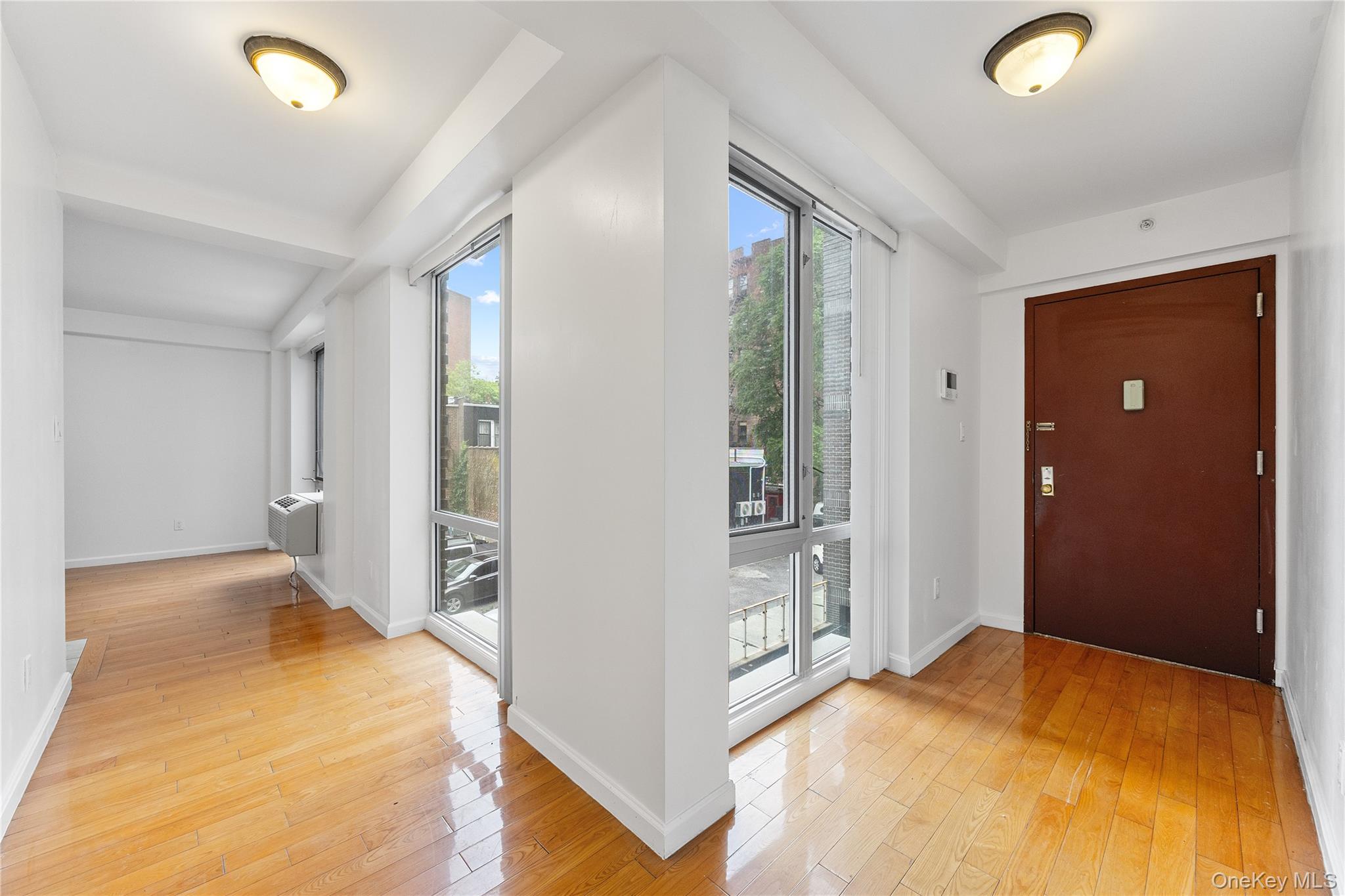 139-30 34th Avenue, Unit 3B Queens, NY 11354 - Photo 5 of 20 a view of livingroom with bathroom