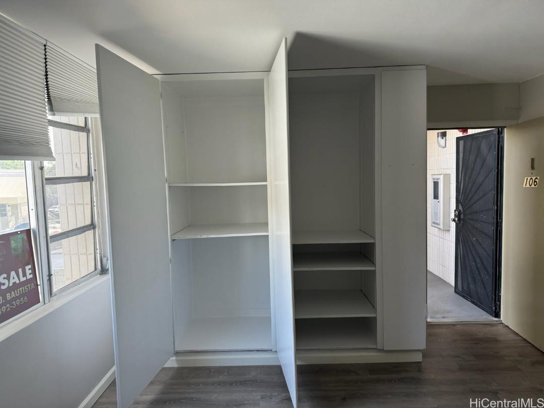 98-1030 Moanalua Road, Unit 5106 Aiea, HI 96701 - Photo 6 of 15 entertainment/storage cabinet in the living room