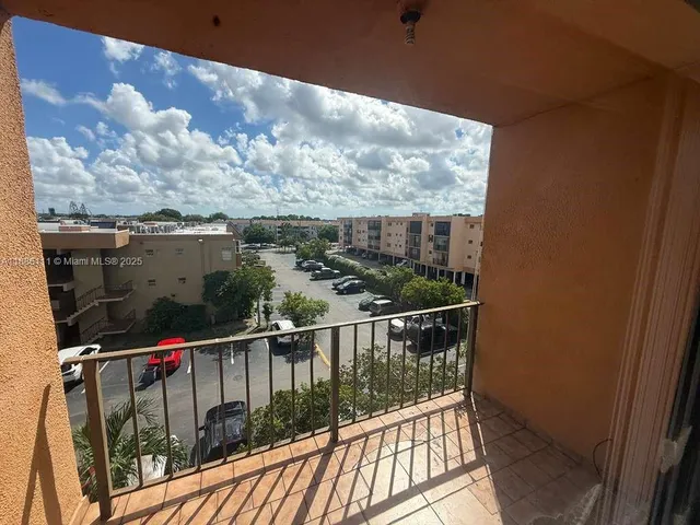 a view of a balcony with an outdoor space