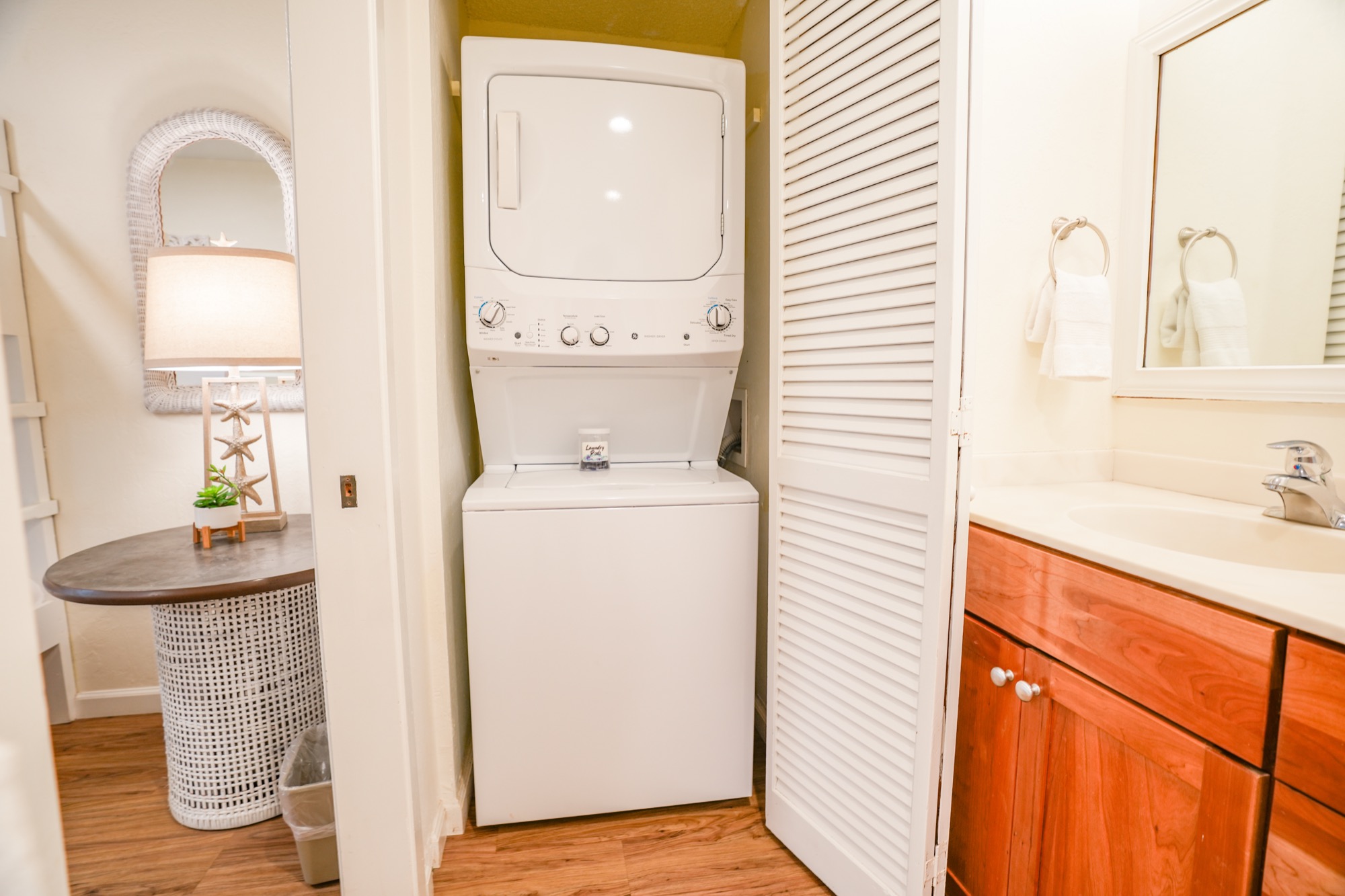 1901 Poipu Road, Unit 112 Koloa, HI 96756 - Photo 15 of 21 a bathroom with a sink a toilet and mirror