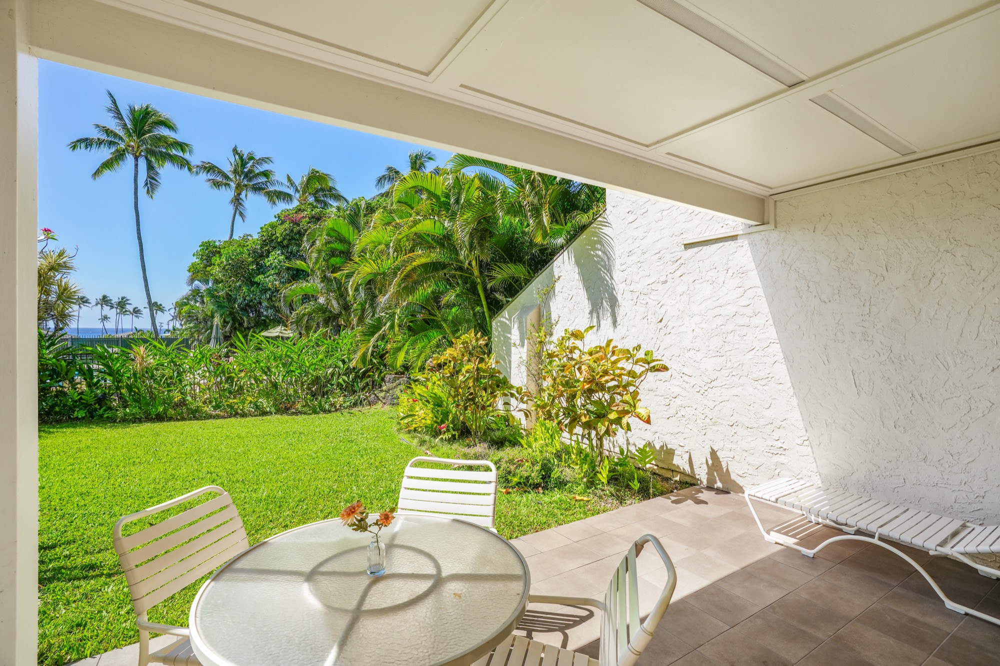 1901 Poipu Road, Unit 112 Koloa, HI 96756 - Photo 16 of 21 a view of yard with patio