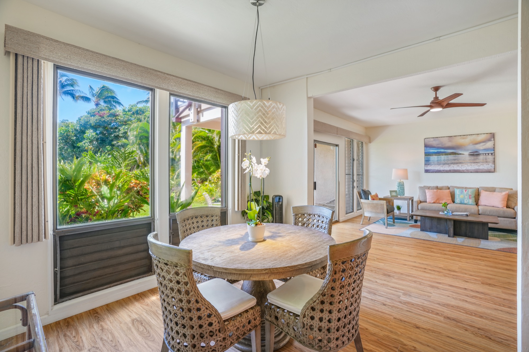 1901 Poipu Road, Unit 112 Koloa, HI 96756 - Photo 6 of 21 a view of a dining room with furniture window and wooden floor