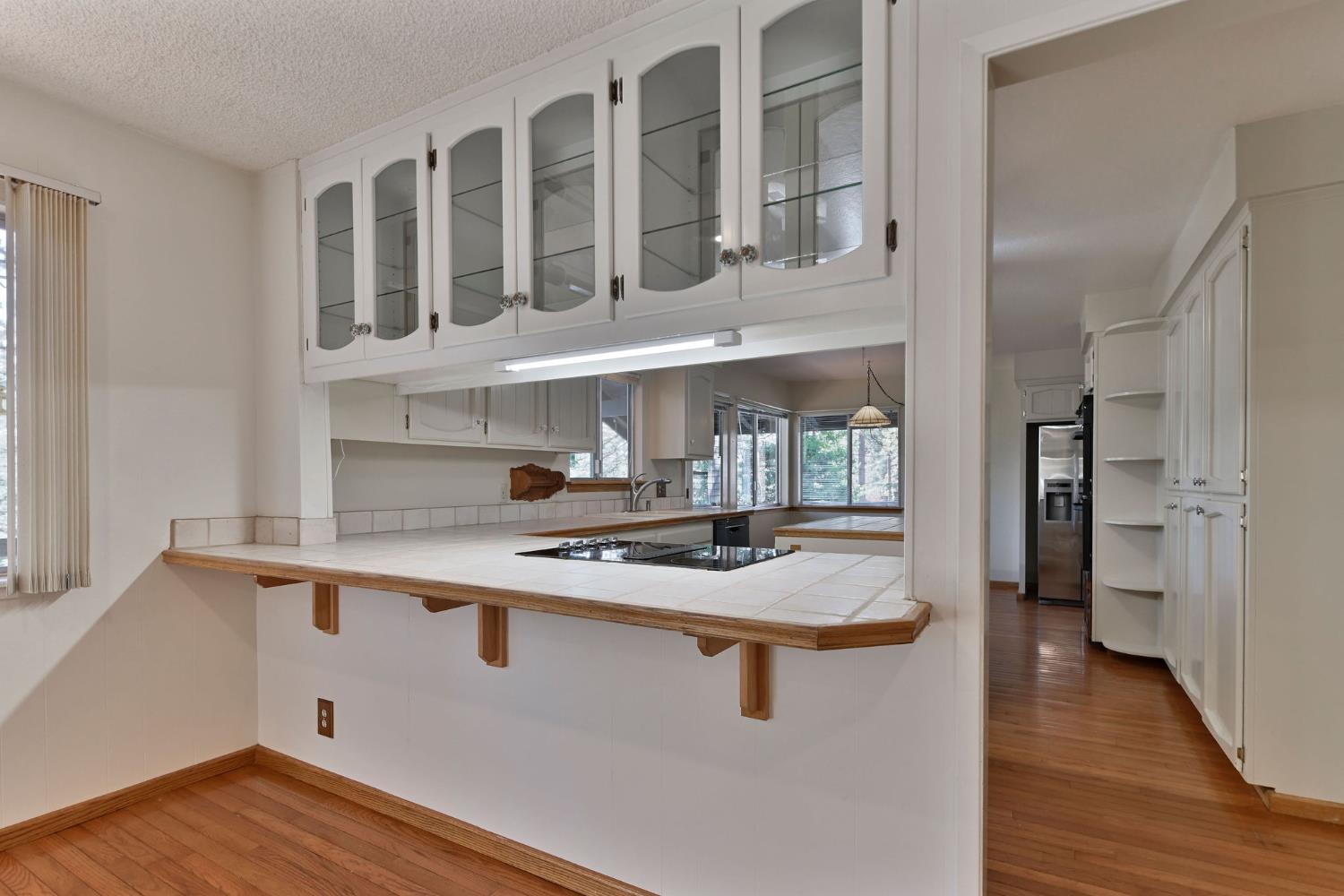 2637 Ruth Lane Arnold, CA 95223 - Photo 12 of 91 a kitchen with stainless steel appliances granite countertop a sink and cabinets