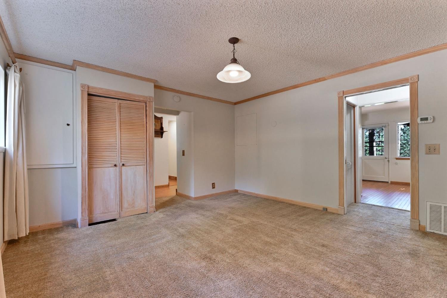 2637 Ruth Lane Arnold, CA 95223 - Photo 24 of 91 an empty room with closet and mirror