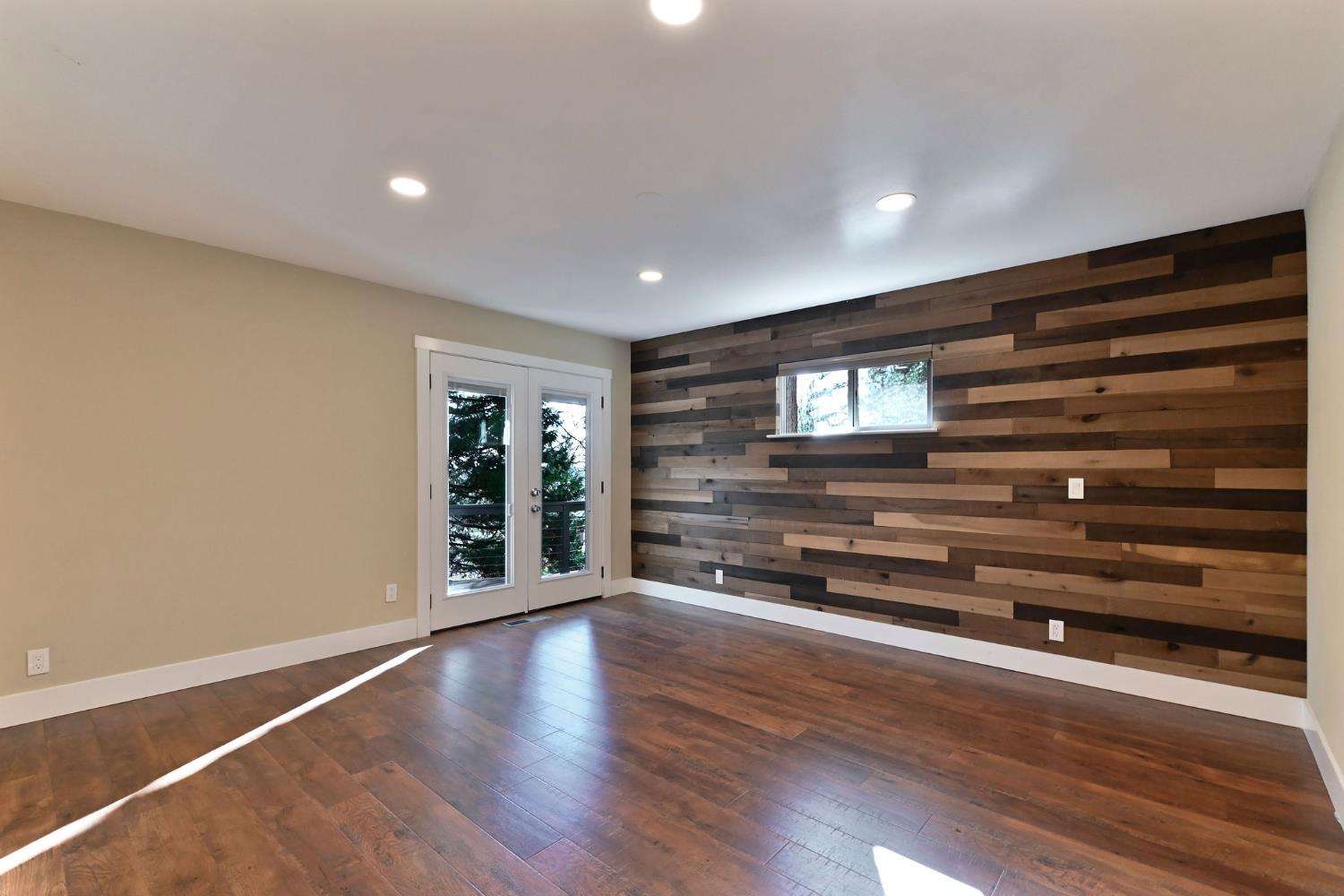 2637 Ruth Lane Arnold, CA 95223 - Photo 29 of 91 a view of room with wooden floor and window