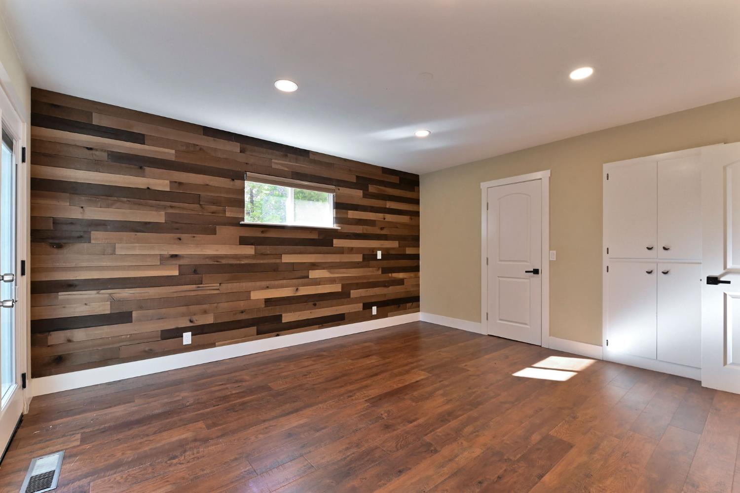 2637 Ruth Lane Arnold, CA 95223 - Photo 31 of 91 a view of room with wooden floor and window