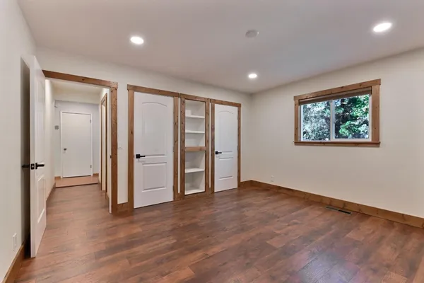 a view of balcony with wooden floor