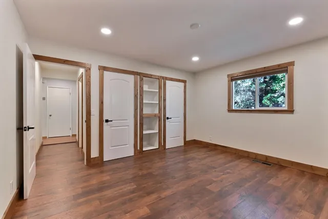 a view of balcony with wooden floor