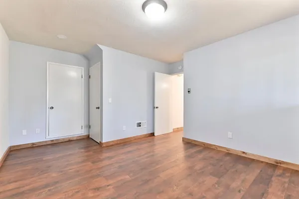 a bird view of residential house with parking space