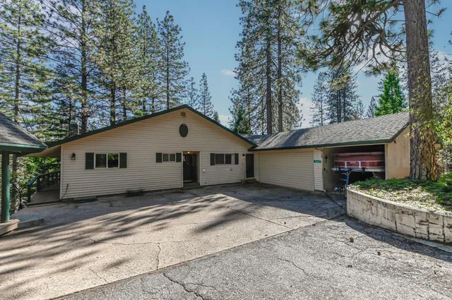 a view of a swimming pool with an outdoor space and seating area
