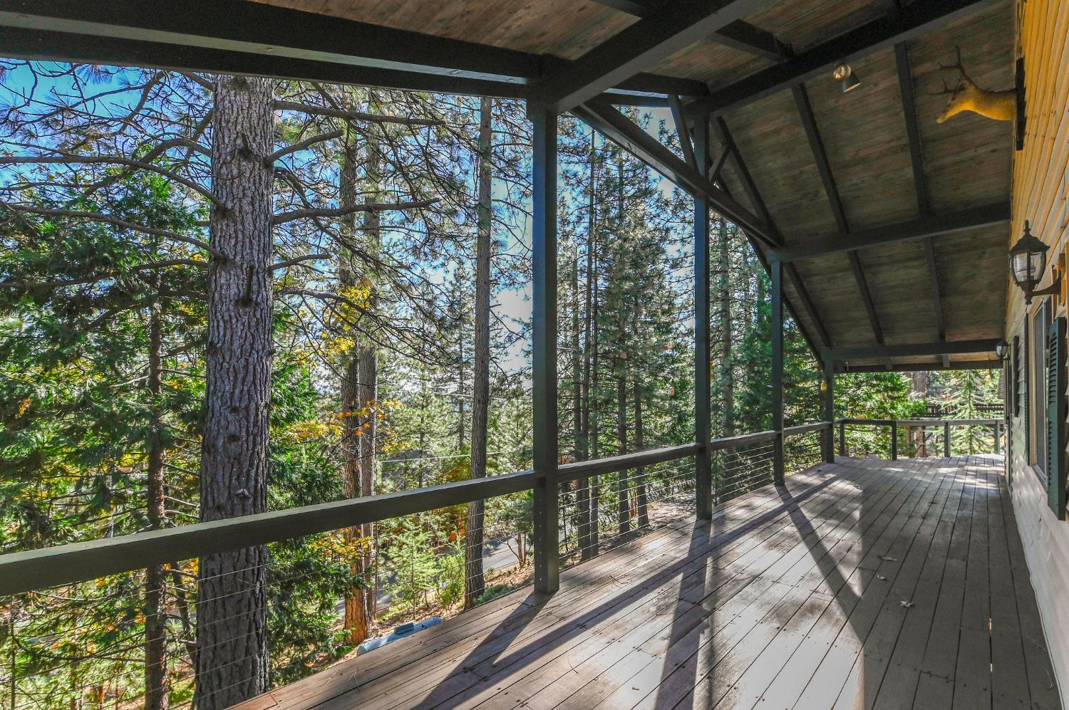 2637 Ruth Lane Arnold, CA 95223 - Photo 70 of 91 a view of a balcony with wooden floor