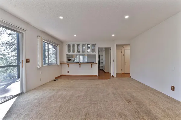 a kitchen with stainless steel appliances granite countertop a sink and cabinets