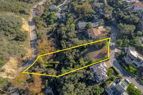 a view of swimming pool with wooden deck