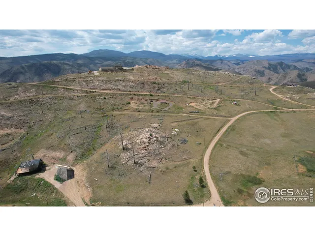 a view of mountain with ocean