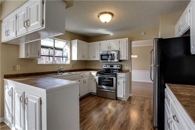 1041 Aldersgate Road Antioch, TN 37013 - Photo 5 of 20 Gorgeous new kitchen with tile counters and stainless steel appliances