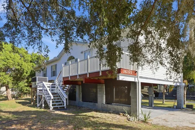 a front view of a building with street view