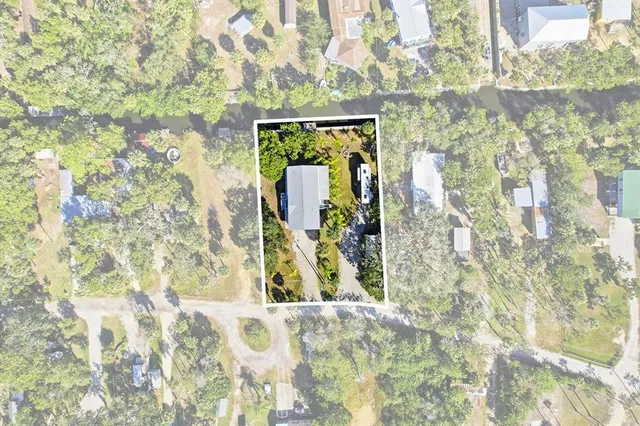 a view of deck with wooden floor and floor to ceiling windows