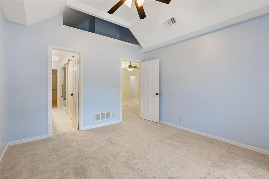 609 Seville Road Denton, TX 76205 - Photo 29 of 40 Second Primary Bedroom upstairs with secret loft space and en-suite bathroom.