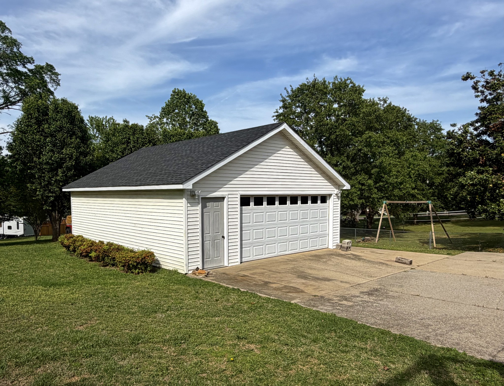 145 South Palmers Chapel Road White House, TN 37188 - Photo 28 of 30 a front view of a house with a garden and yard
